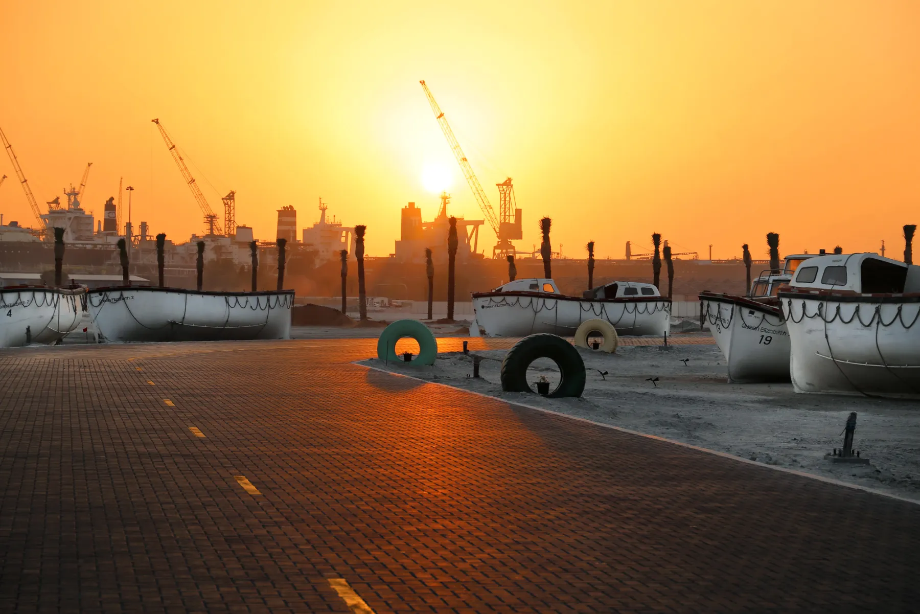 Sunset over the harbour at Mina Rashid