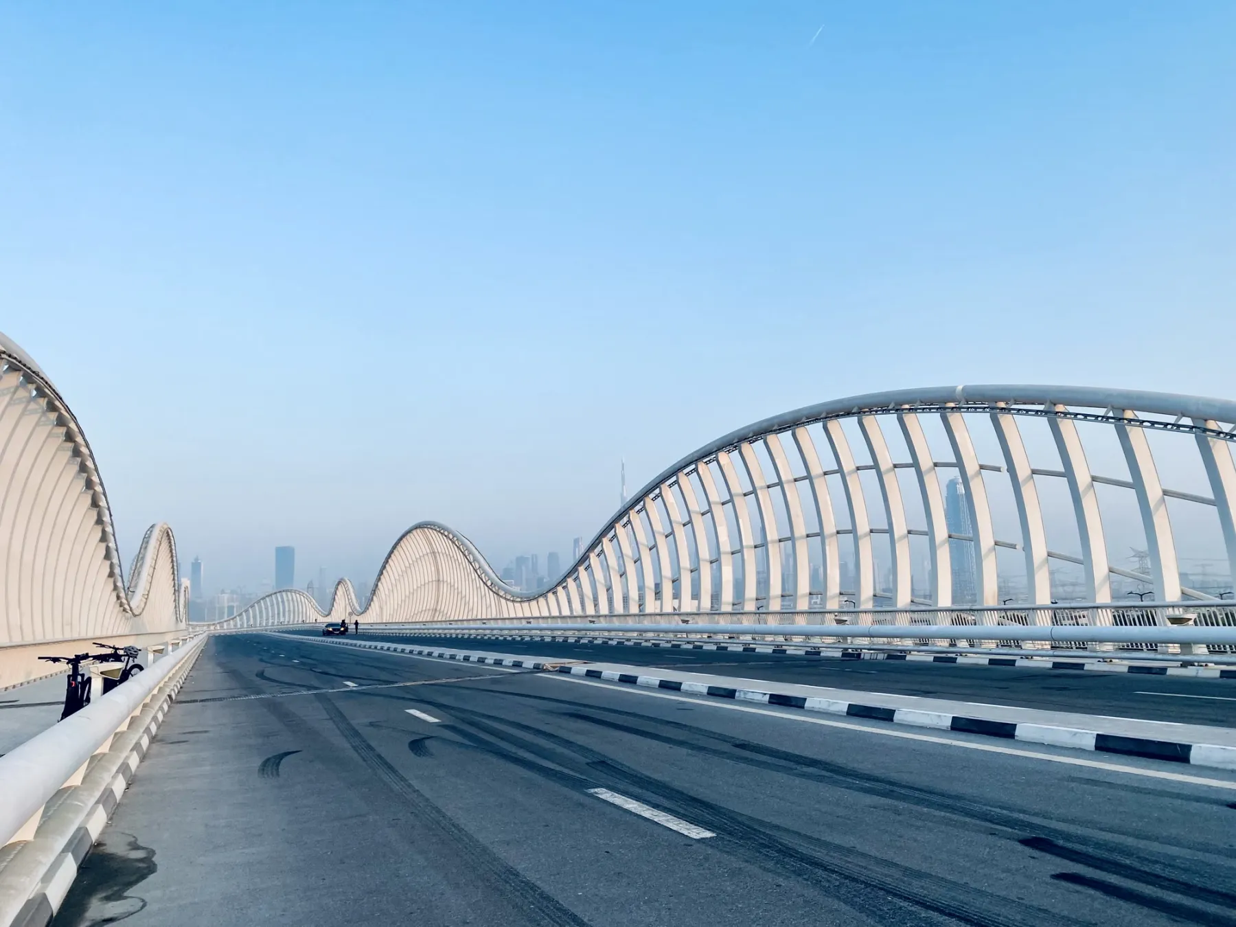 The Meydan Bridge in Nad Al Sheba under a clear sky